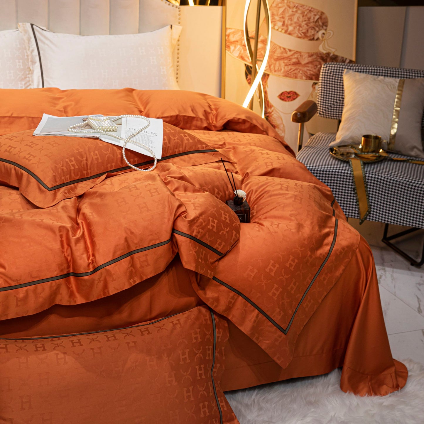 Luxurious tangerine sateen bedding set with Tencel cotton, featuring duvet cover, sheets, and pillowcases in elegant design.