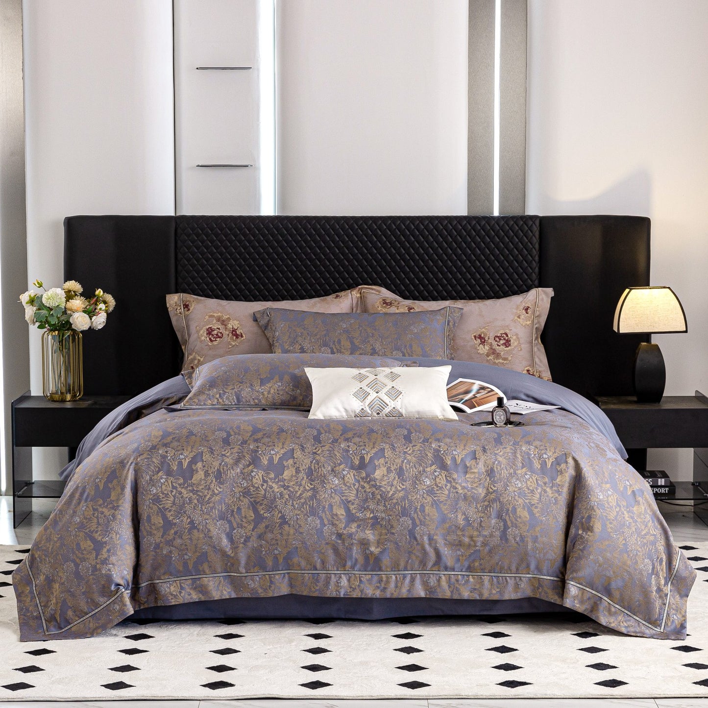 Luxurious Versailles sateen bedding set in muted tones with floral patterns on a modern black bed frame