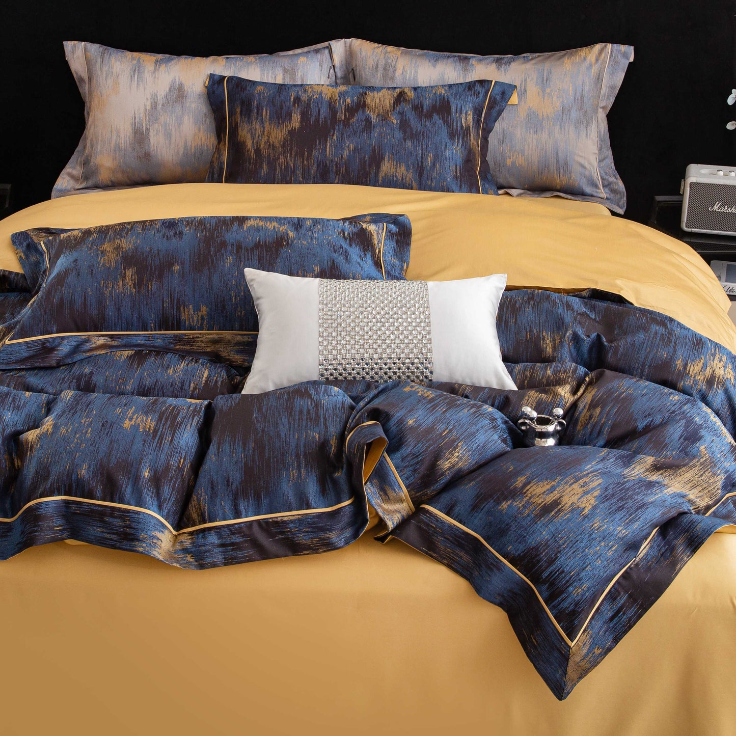 Luxurious Marrakech sateen bedding set in blue and gold tones with high-quality Tencel cotton for a smooth, breathable sleep experience.
