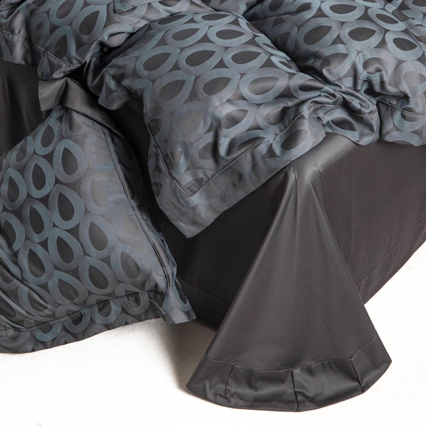 Luxurious Brooklyn bedding set with modern geometric charcoal and slate grey pattern in soft, breathable Tencel cotton fabric.