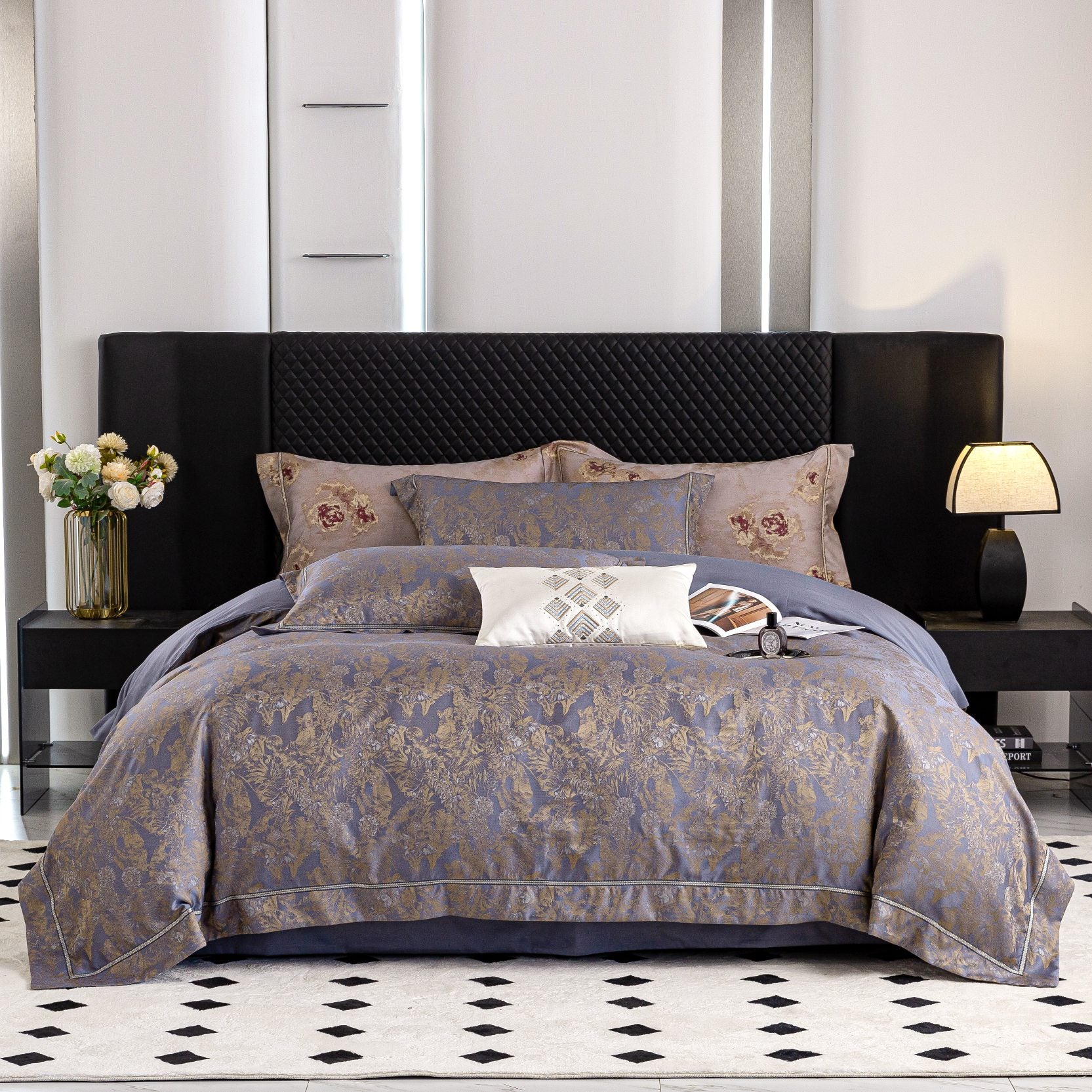 Luxurious Versailles sateen bedding set in muted tones with floral patterns on a modern black bed frame