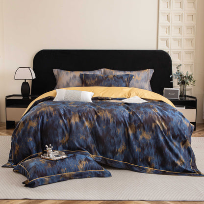 Luxurious Marrakech sateen bedding set in blue and gold tones, crafted from breathable, silky smooth Tencel cotton.