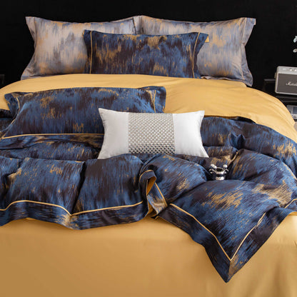 Luxurious Marrakech sateen bedding set in blue and gold tones with high-quality Tencel cotton for a smooth, breathable sleep experience.