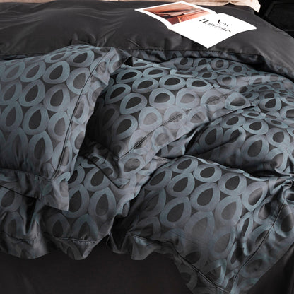 Modern geometric pattern sateen bedding set in charcoal and slate grey with a silky smooth texture and breathable fabric.