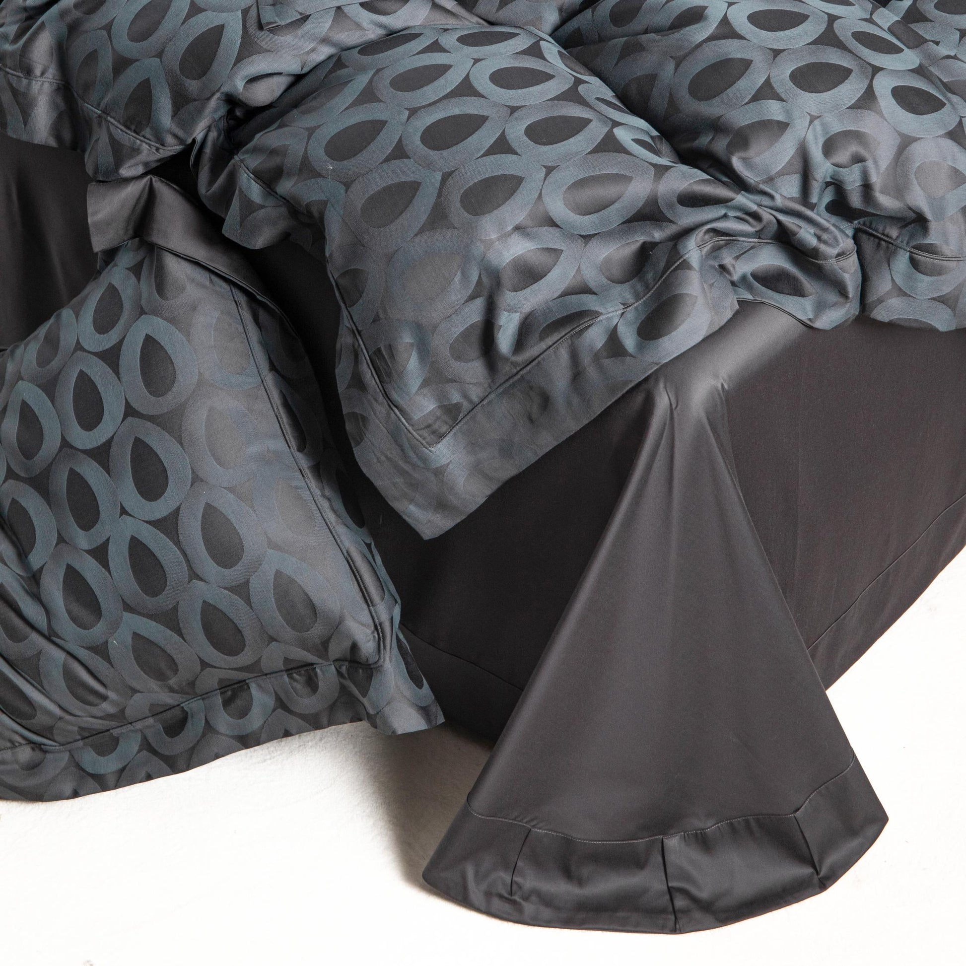 Luxurious Brooklyn bedding set with modern geometric charcoal and slate grey pattern in soft, breathable Tencel cotton fabric.