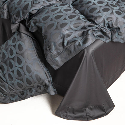 Luxurious Brooklyn bedding set with modern geometric charcoal and slate grey pattern in soft, breathable Tencel cotton fabric.