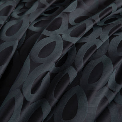 Close-up of Brooklyn modern geometric bedding in deep charcoal and slate grey with smooth, breathable Tencel cotton fabric.